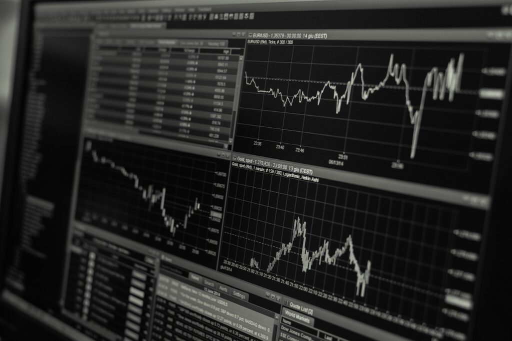 Marketing in a down economy - black and white photo of graphs on a screen